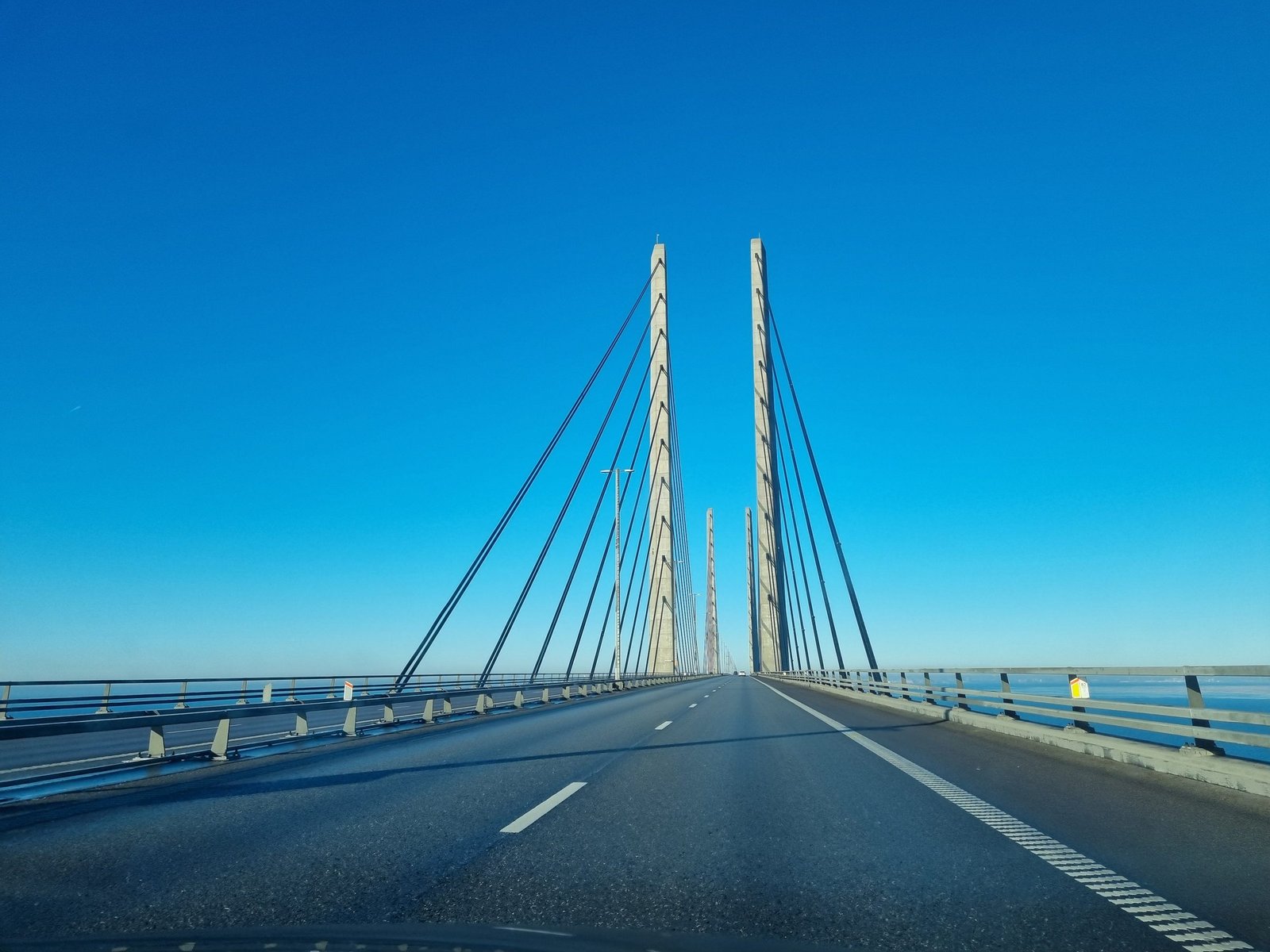 Driving beneath the stay cables of the Øresund Bridge, just before the pylons