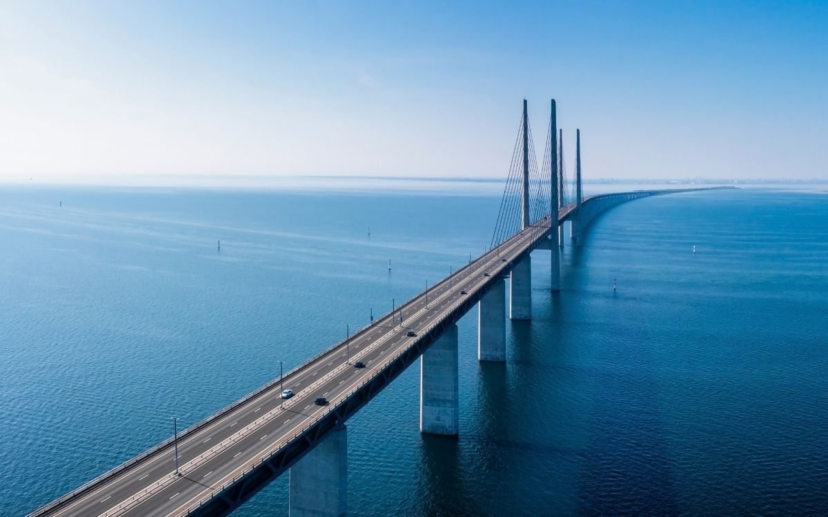 Aerial view of the Øresund Bridge with its pylons and traffic over the Øresund