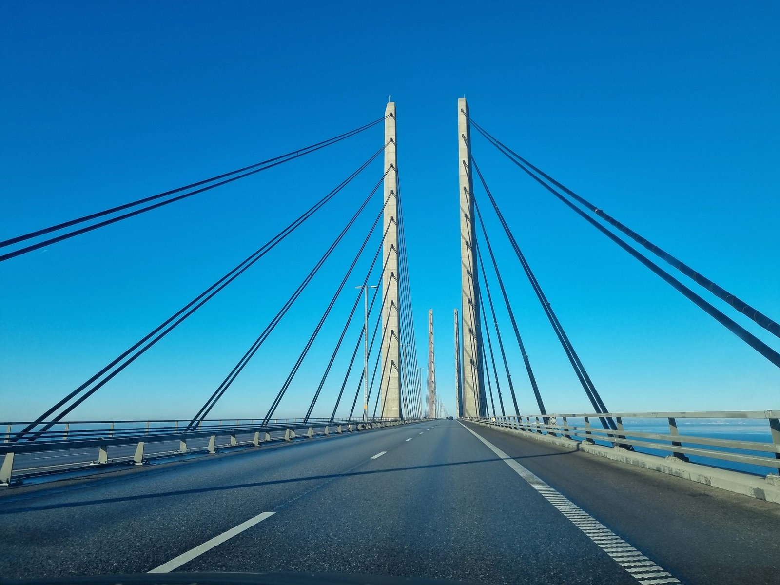 Heading straight between the Øresund Bridge pylons, with stay cables on both sides