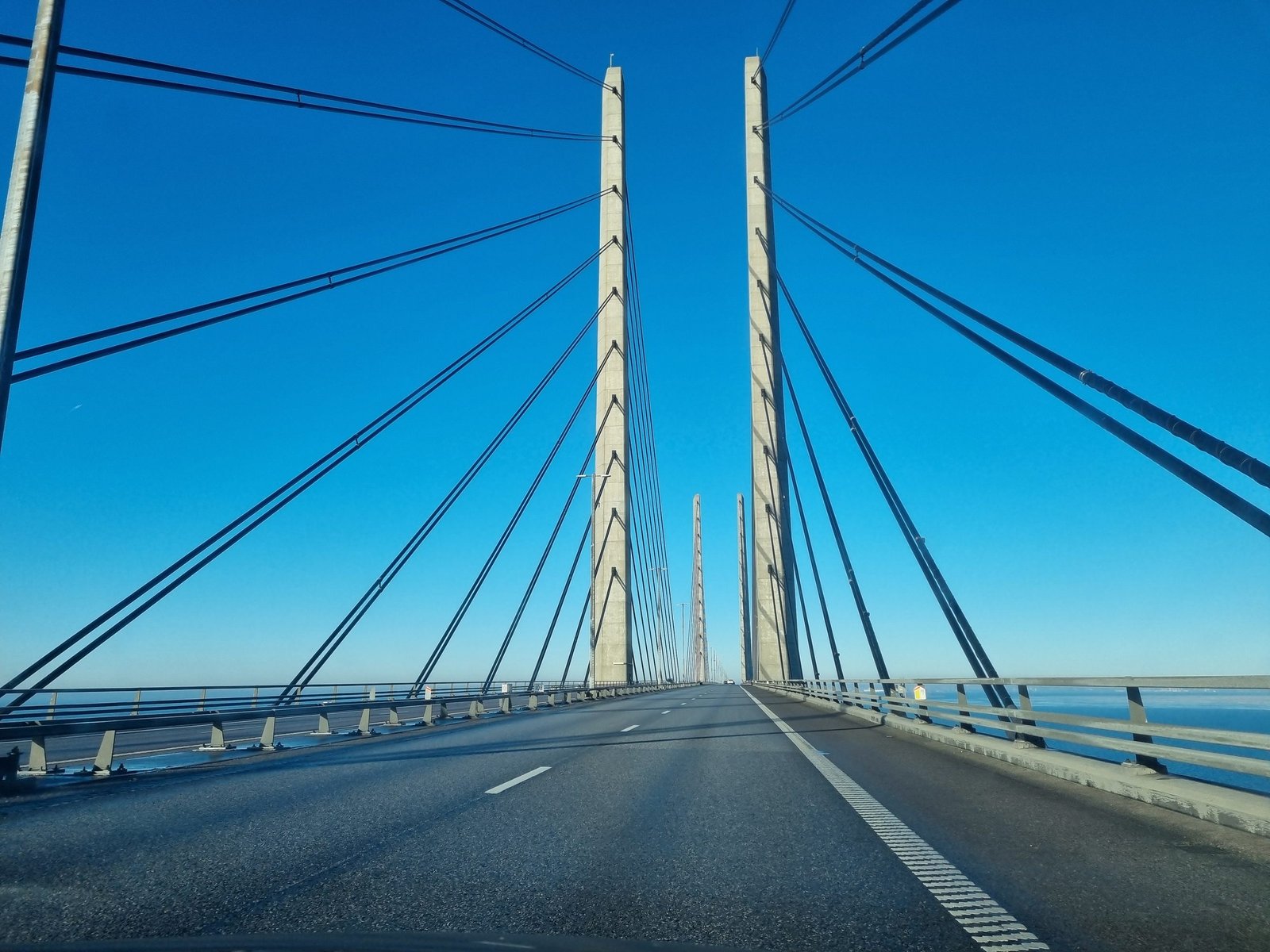 Close-up of the Øresund Bridge pylons with the stay cables fanning out over the carriageway