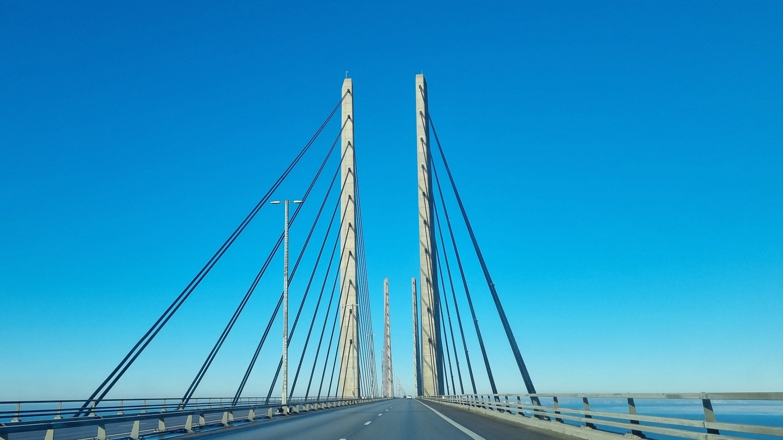 Driving across the Øresund Bridge towards the pylons, the toll is paid at Lernacken